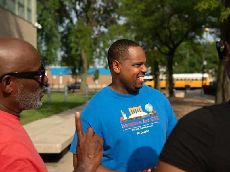 Profile of Anthony Hargrove in a blue shirt with trees behind him.